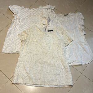 Three white summer tops